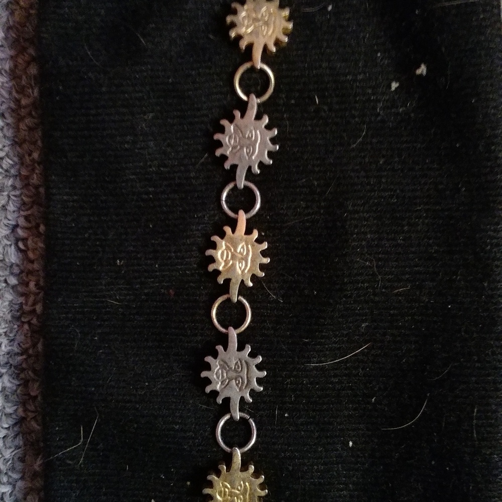 Small Silver and gold colored sun bracelet